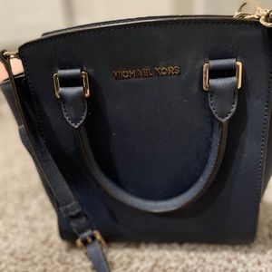 Navy and gold Michael Kors crossbody bag